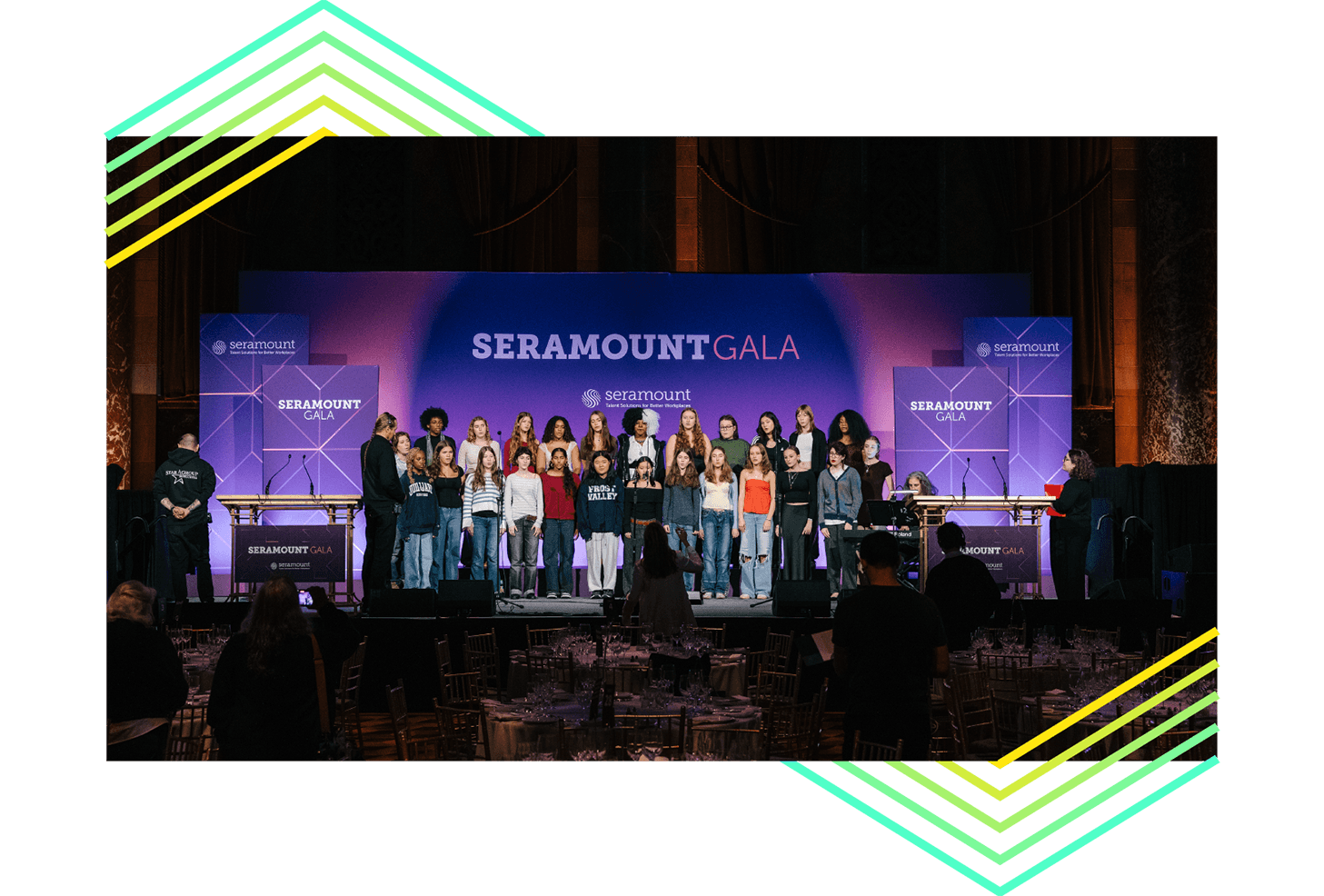 children's choir group on stage with Seramount Gala purple backdrop
