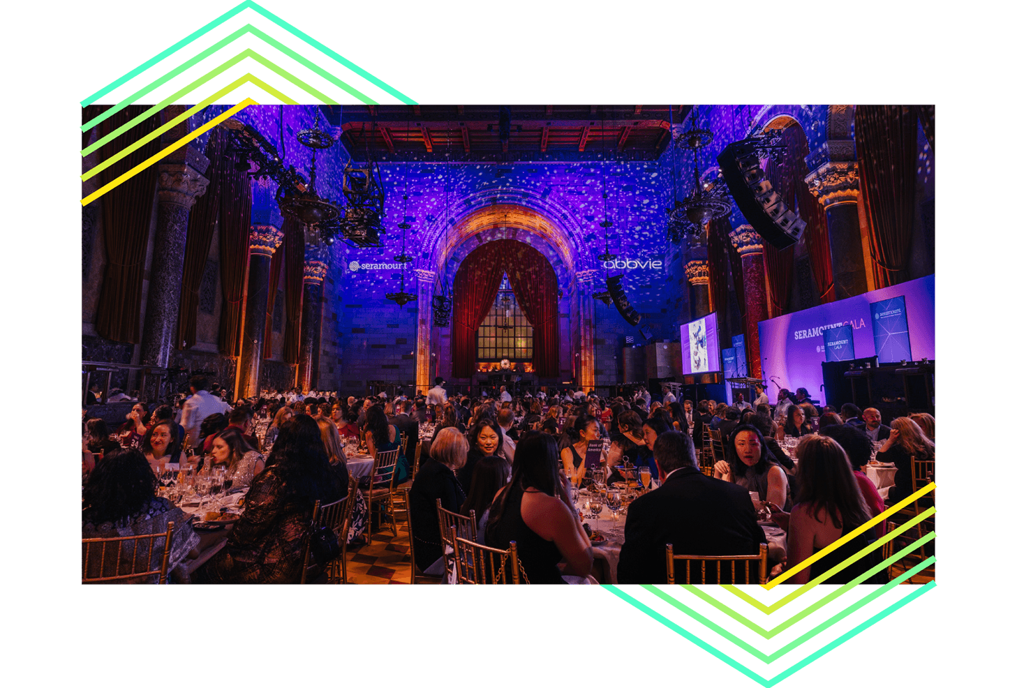 Photo of large main banquet hall room with people seated at round tables at Cipriani 42nd St